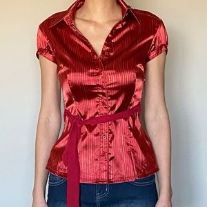 Red satin feel too with gold print in small and cones with optional belt.